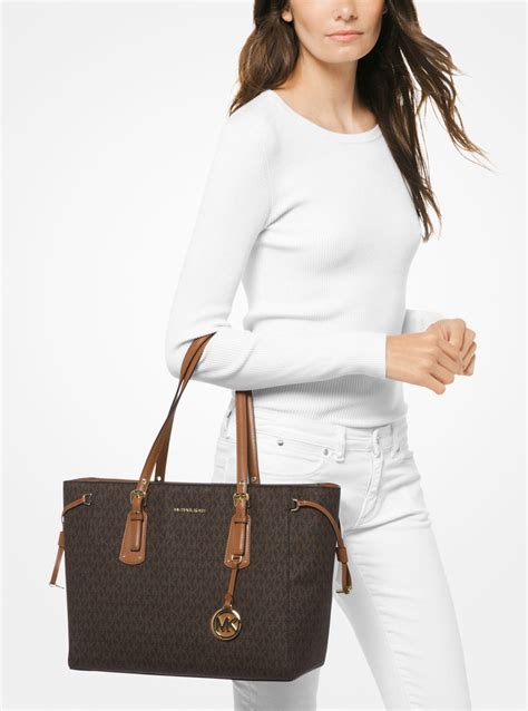 michael kors voyager medium logo tote replica|michael kors large saffiano tote.